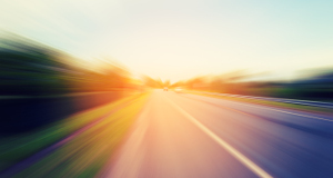 Abstract motion blur of the road with sunlight